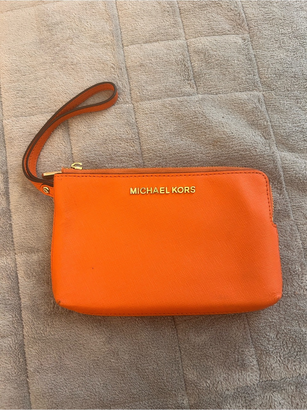 Michael Kors orange double zip wristlet